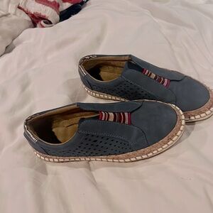 Gray/blue leather slip-on shoes. Size 7 1/2. White stitched sole.